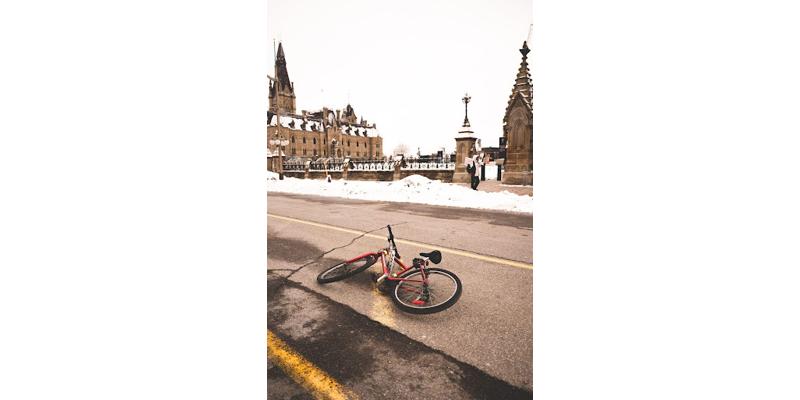 Bicycle lying on the road after accident – East Bay injury claim