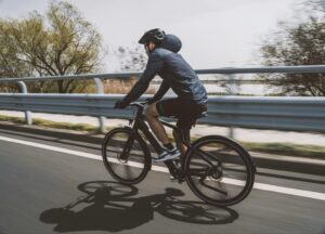 Cyclist riding a bicycle on a roadway